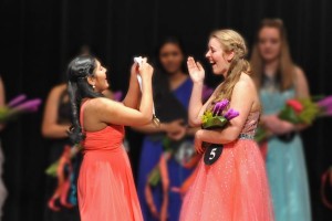 Ritika Punathil, the retiring Menomonee Falls DYW of the Year for 2016, presented a DYW Medallion to Benning.
